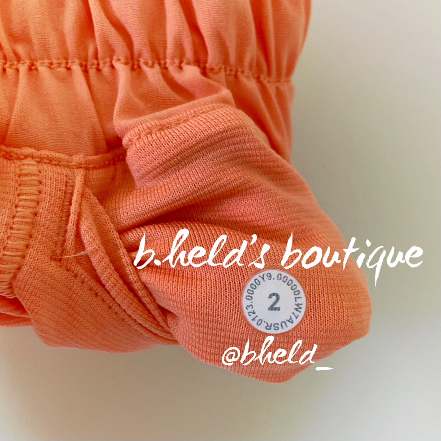 lululemon Hotty Hot Low-Rise Lined Short 2.5" in Sunny Coral, Size 2