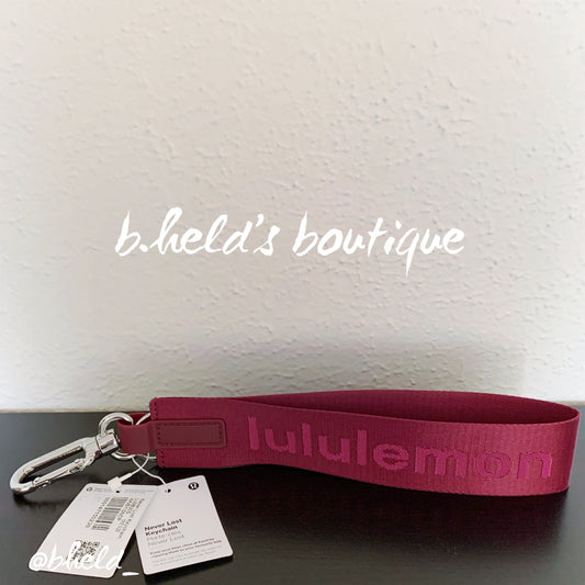 lululemon Never Lost Keychain (2023 Style) in Wine Berry/Sonic Pink, One Size